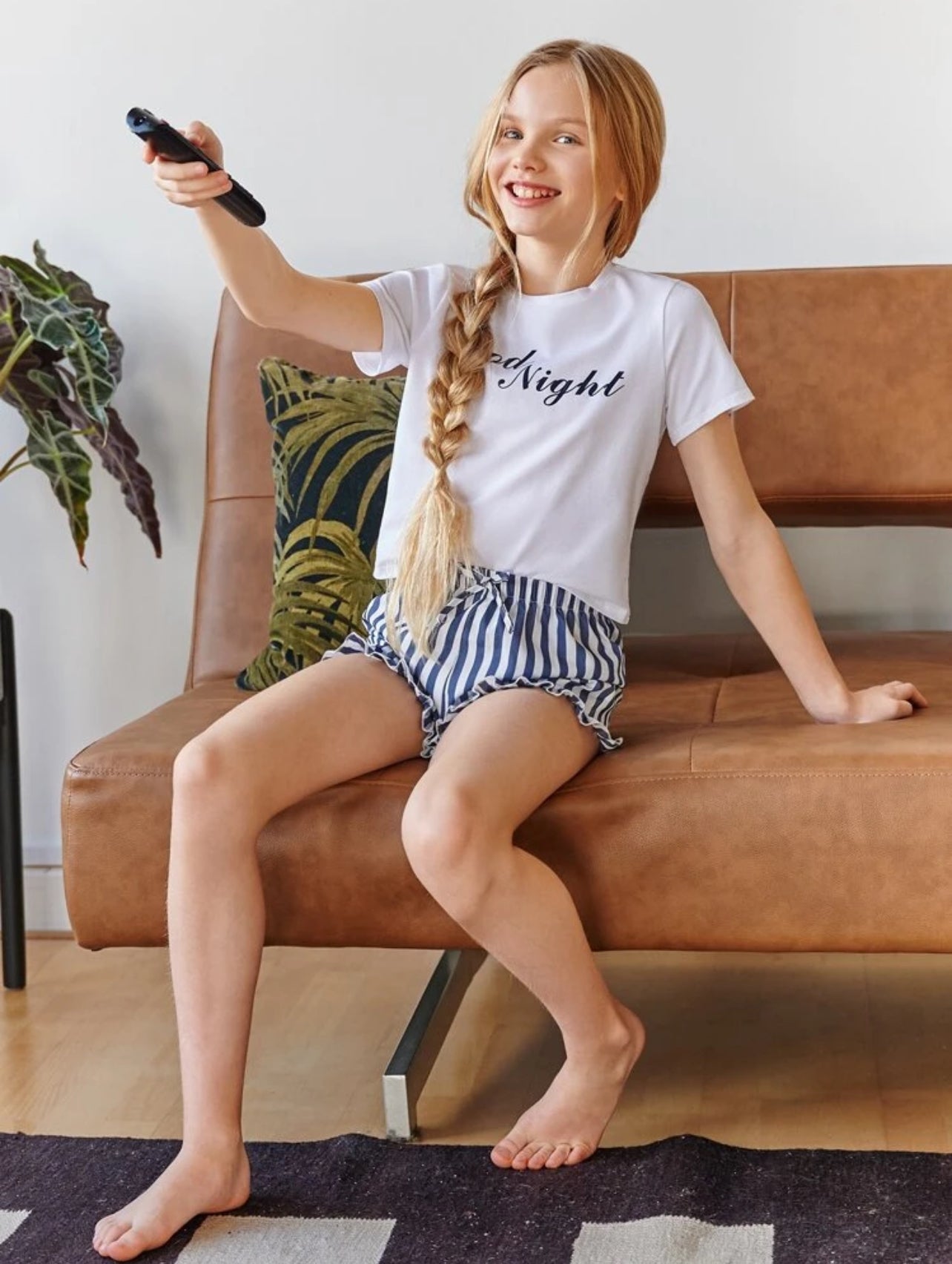 SHEIN Girls Letter Graphic Tee & Striped Ruffle Hem Shorts PJ Summer Set - 7Y