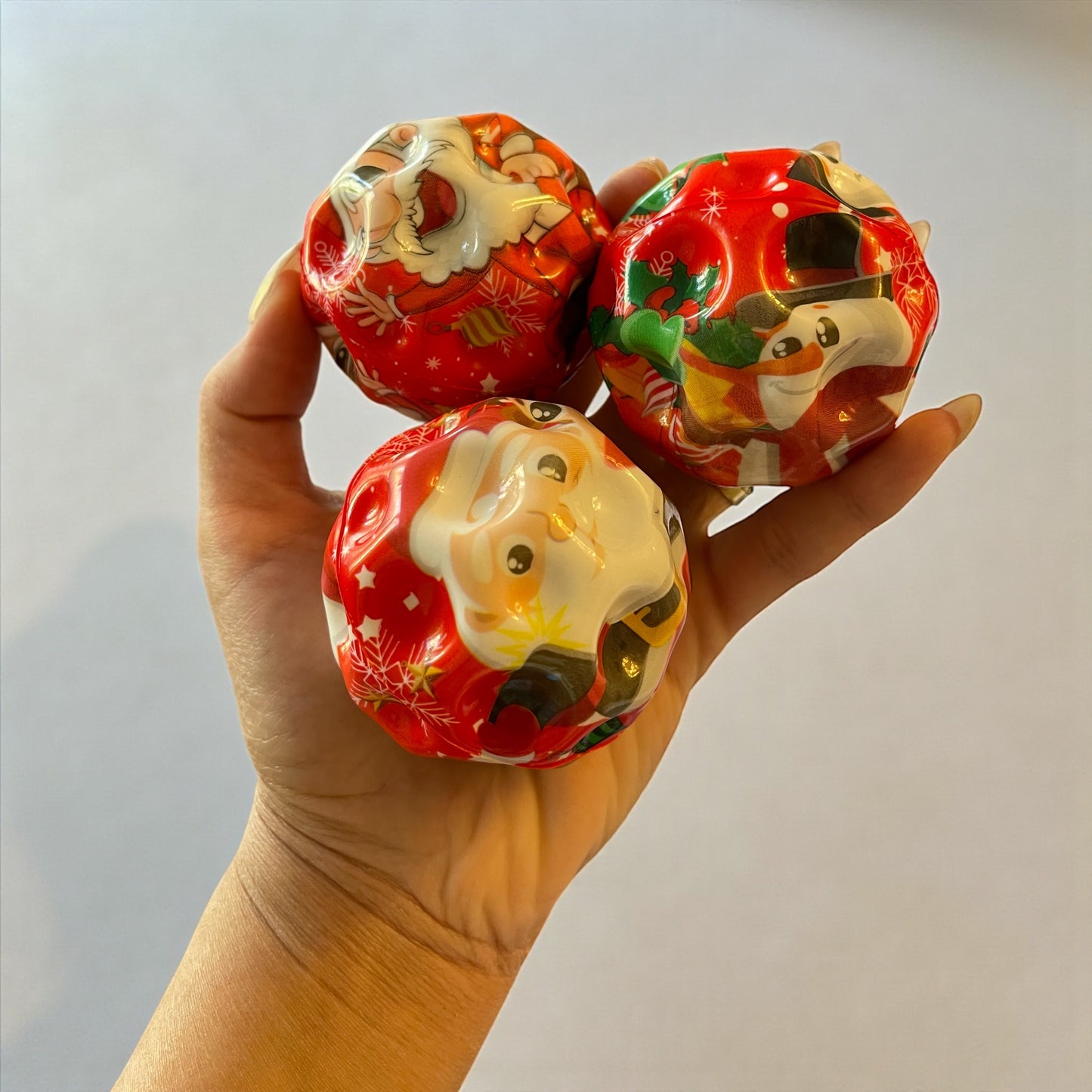 Christmas Squishy Stress Balls – Santa & Snowman Designs (Rubber Material) – 1pc