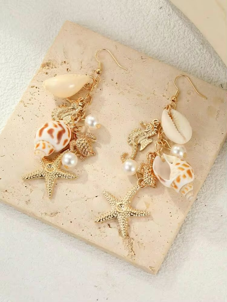 Seaside Charm Shell & Starfish Drop Earrings – Gold Ocean-Inspired Statement Earrings