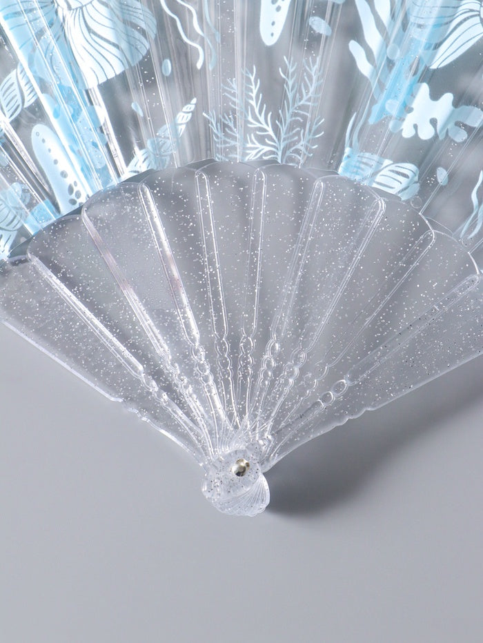 Folding plastic fan "Seashells and corals", blue, glitter, 23 cm