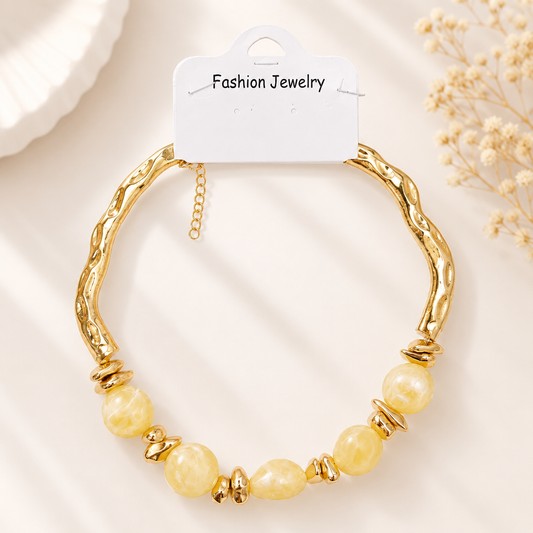 Elegant Gold Statement Necklace with Marble Beads – Cream & Gold