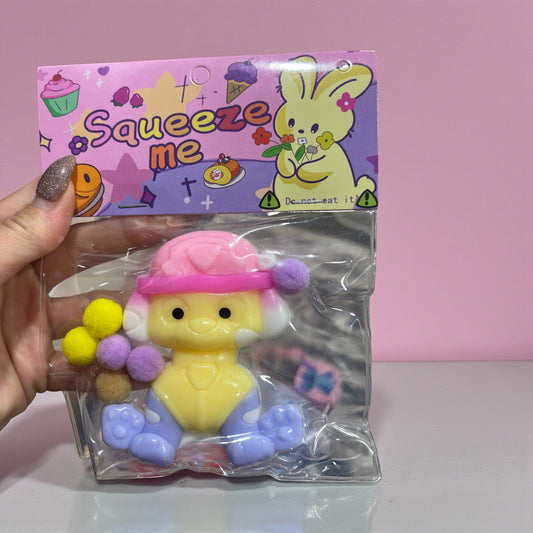 Cute Squeeze Toy – Soft Pastel Stress Relief Squishy with Pom-Pom Balls