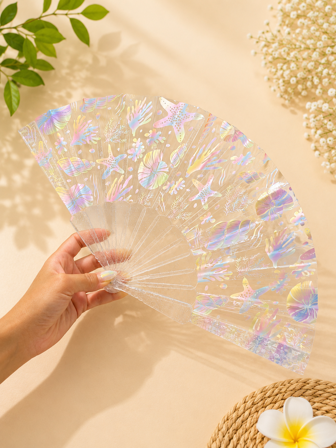 Folding plastic fan "Seashells and corals", blue, glitter, 23 cm