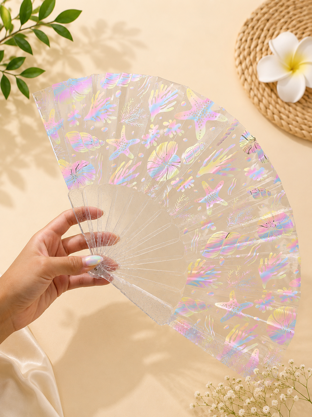Folding plastic fan "Seashells and corals", blue, glitter, 23 cm