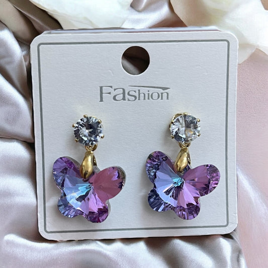 Butterfly-shaped earrings with shiny stone